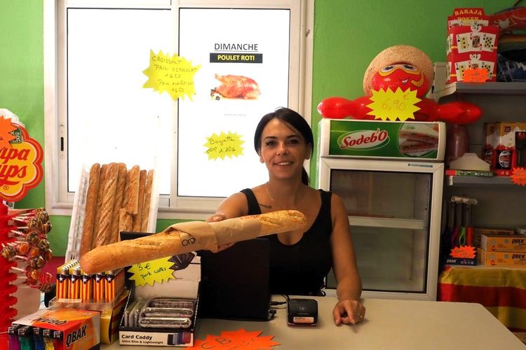 Shop assistant in the grocery shop at camping l'Étoile d'Or